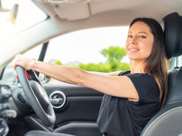 Woman Driving a Car