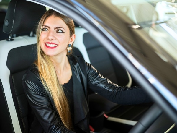 Woman Driving a Car