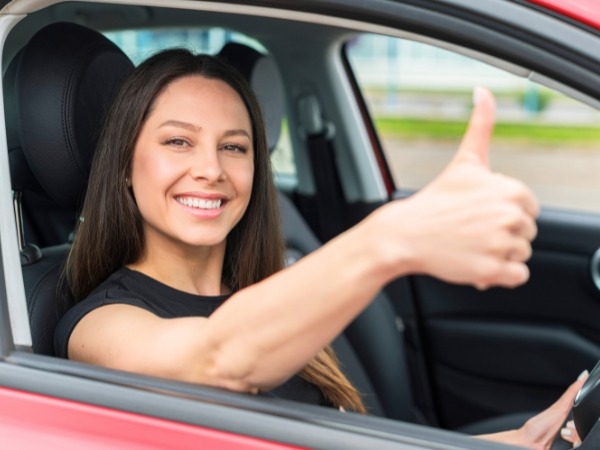 Woman Driving a Car