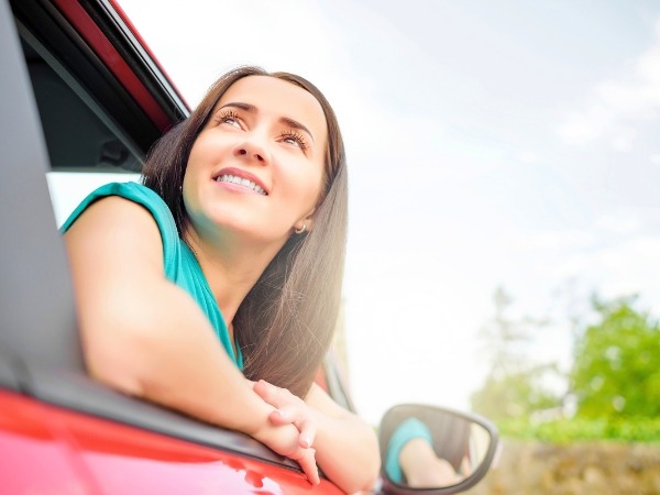 Woman on a Red Car