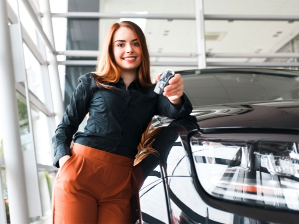 Woman with a Rental Car